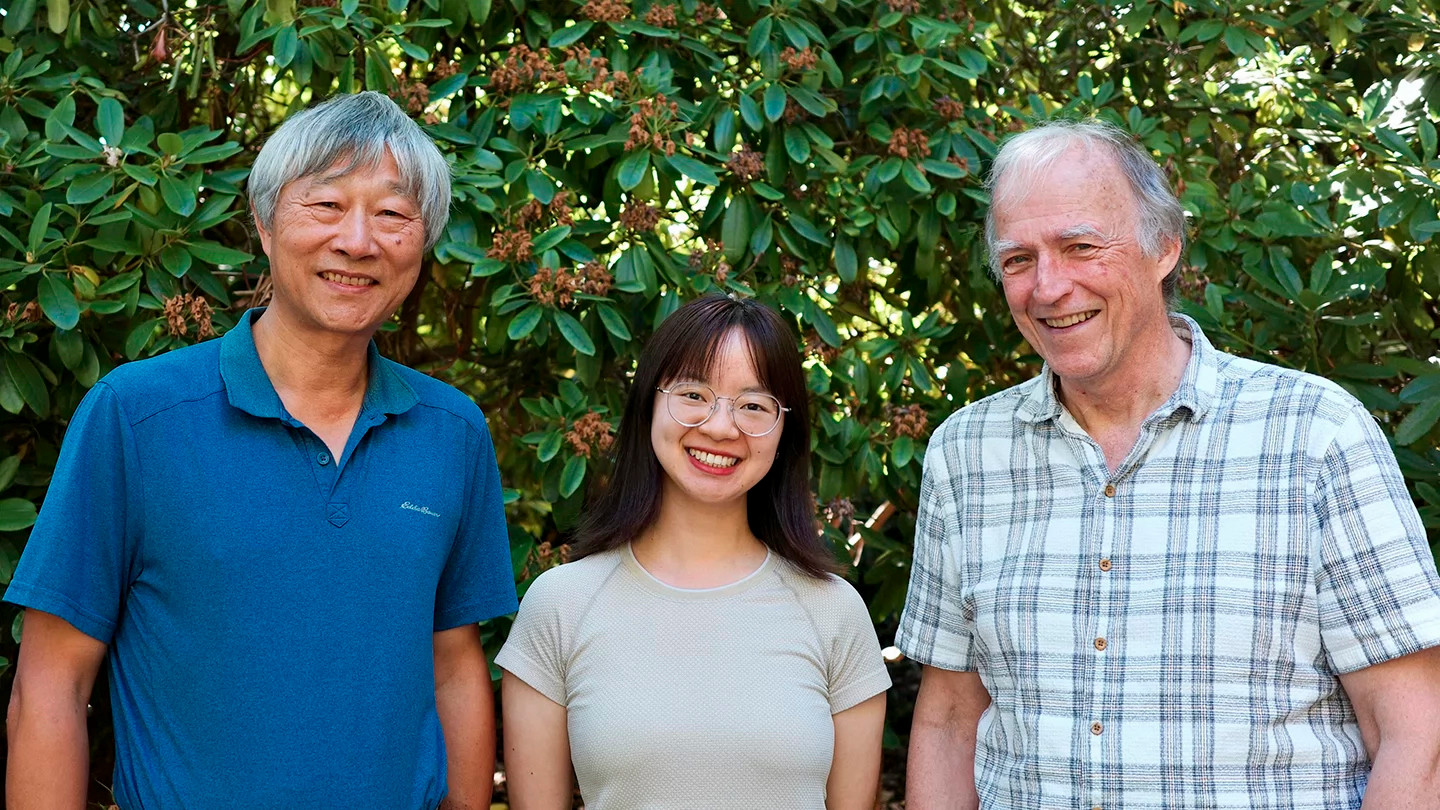 This photo shows, from left to right, PCIC Director Xuebin Zhang, Post-Doctoral Fellow Tong Li and Francis Zwiers, Scientist Emeritus at PCIC.
